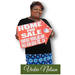 Vickie posing with home for sale sign
